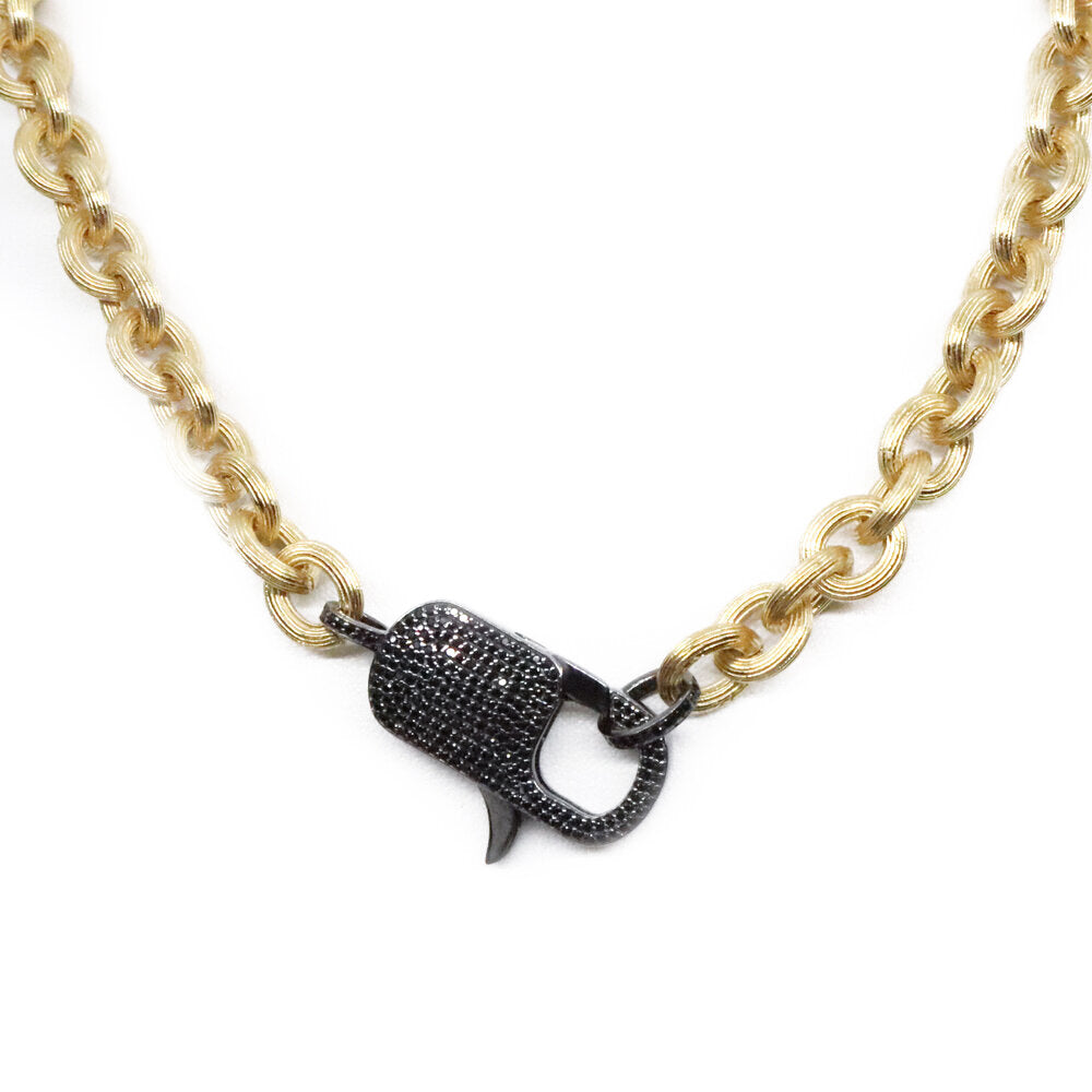 Barb Black Spinel Gold Lock